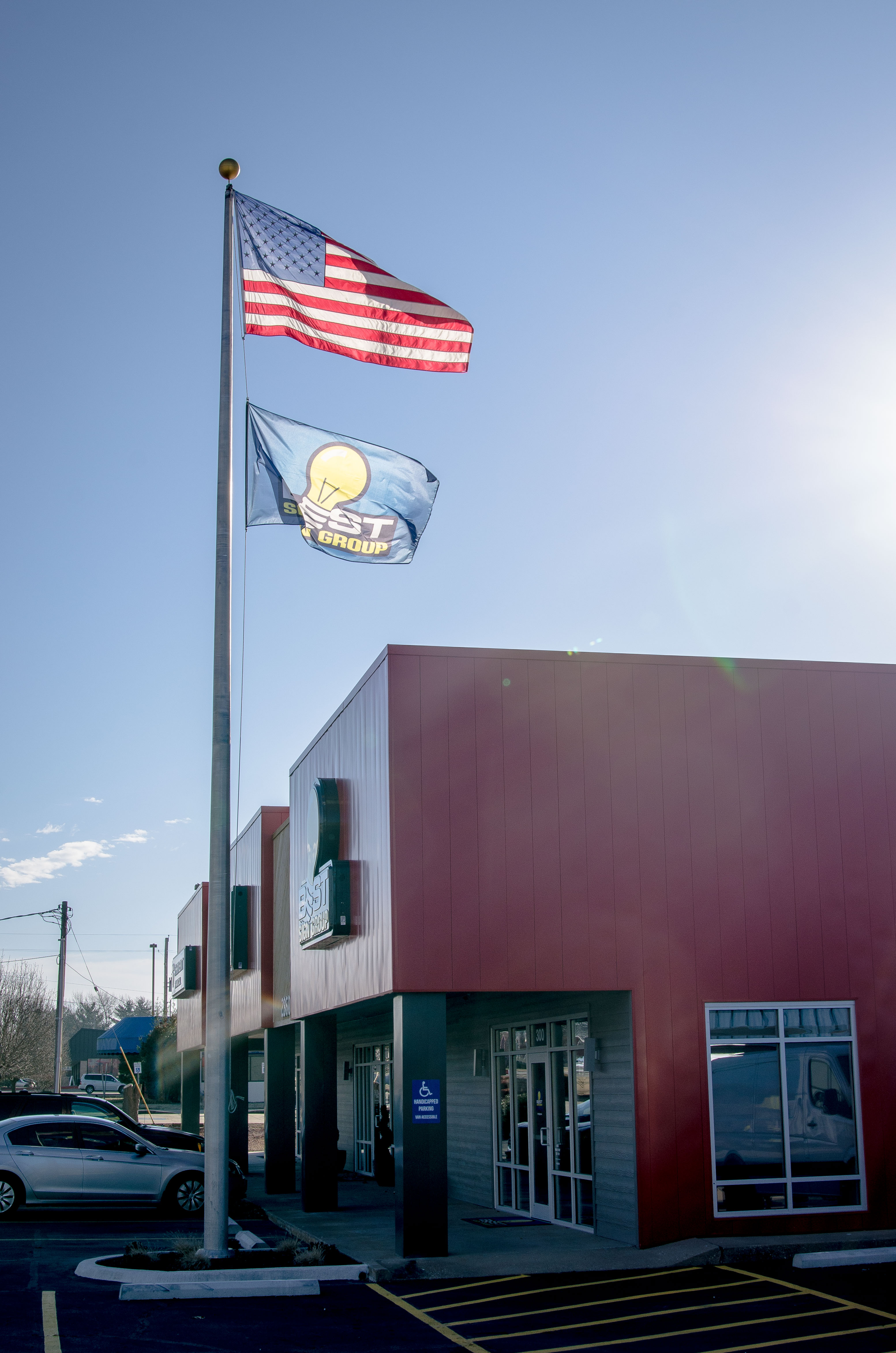 Flag Pole with U.S. and Best Sign Group Flags